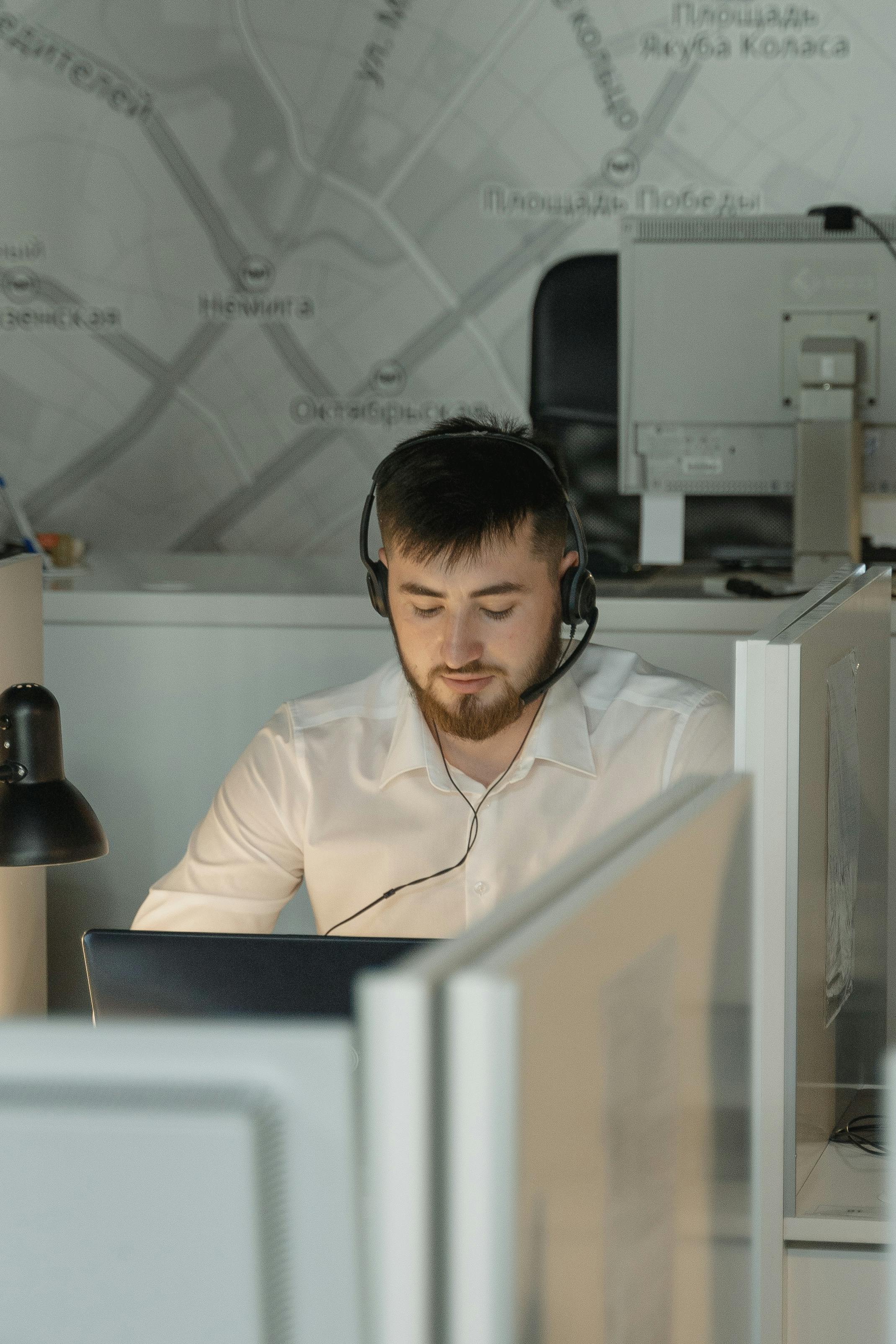Focused call center agent at workstation
