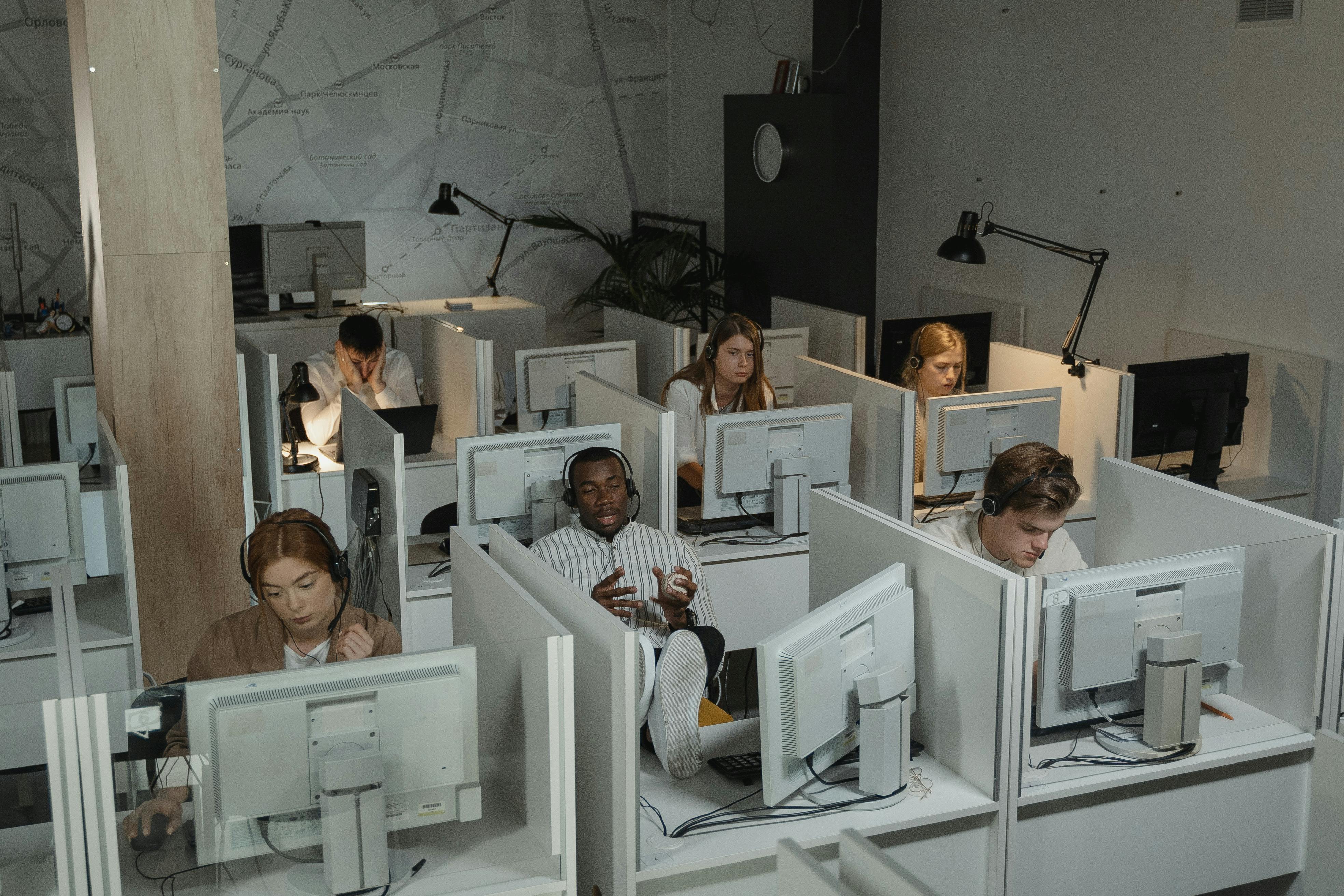 Large call center floor with many agents